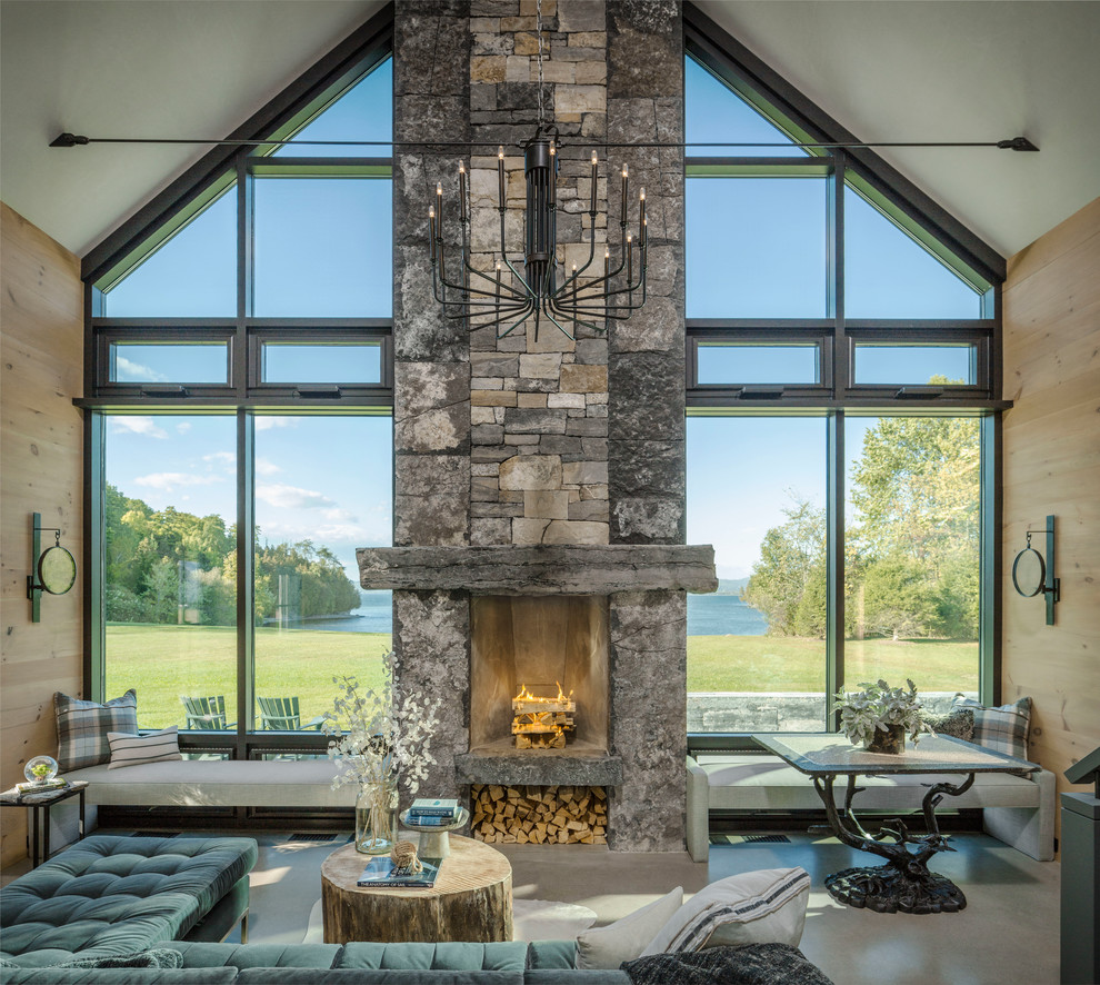 Beach style living room photo in Burlington with a standard fireplace and a stone fireplace