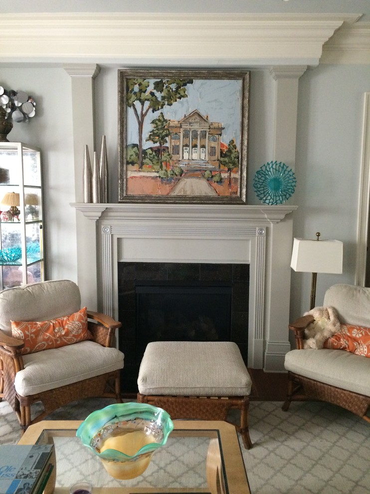 Traditional living room in Jackson with grey walls and a standard fireplace.