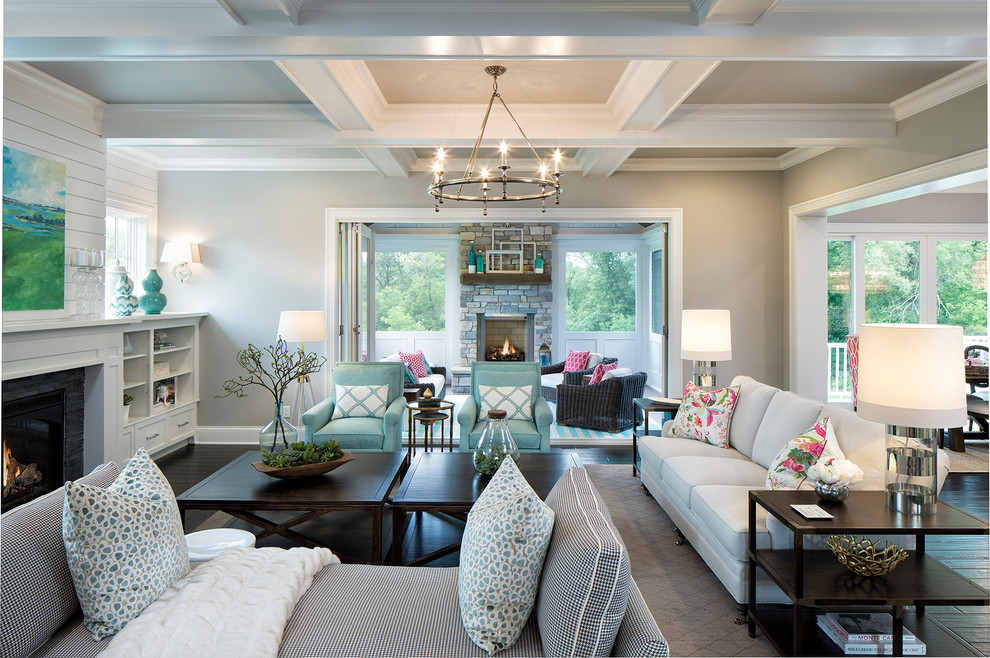 Inspiration for a large coastal formal open plan living room in Minneapolis with grey walls, dark hardwood flooring, a standard fireplace, a stone fireplace surround and no tv.