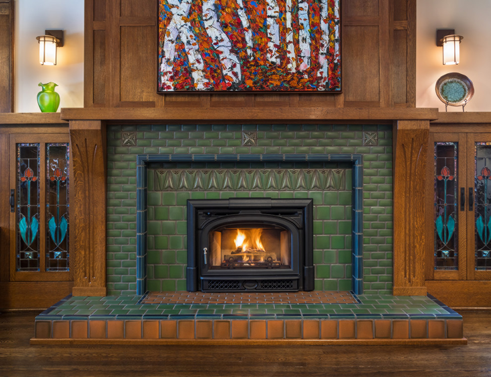 Arts and crafts living room photo in Detroit with a standard fireplace and a tile fireplace