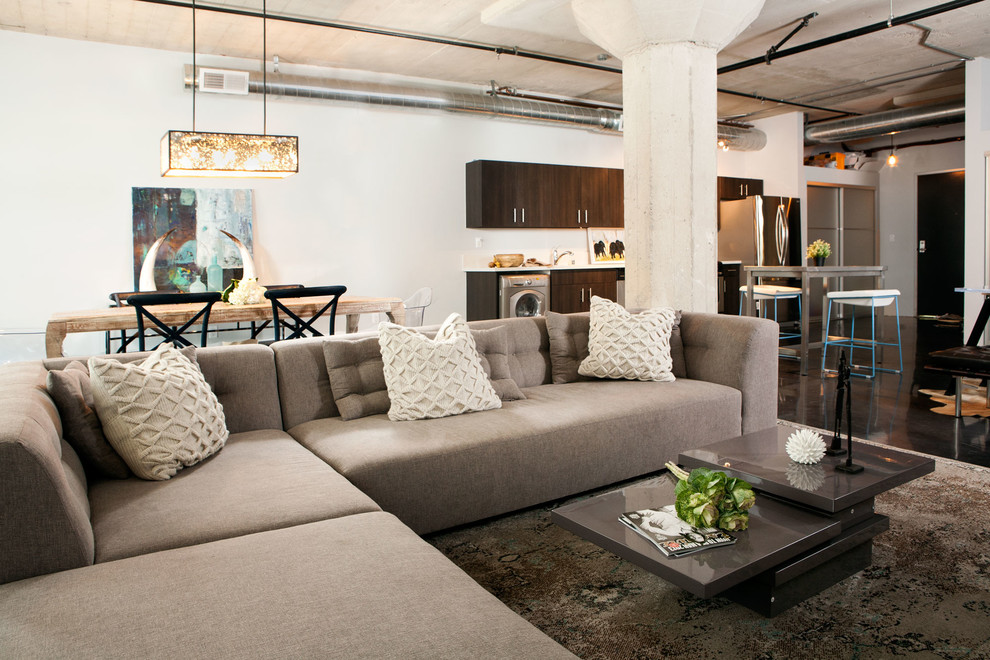 Photo of an urban open plan living room in Los Angeles with white walls.