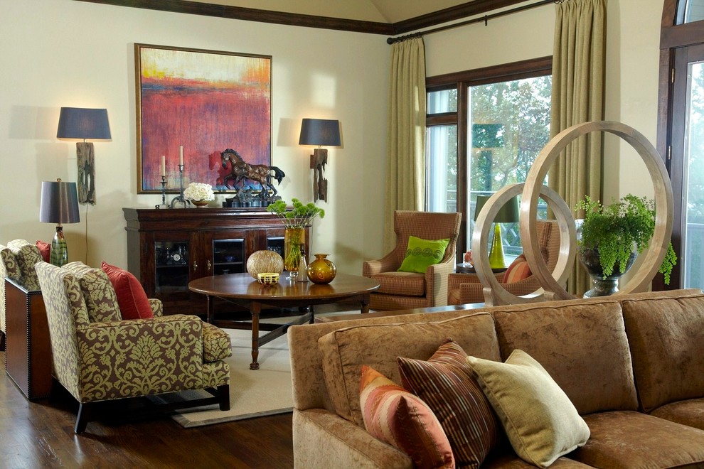 Design ideas for a medium sized eclectic enclosed living room in Atlanta with beige walls and dark hardwood flooring.