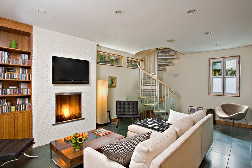 Example of a trendy living room design in New York with a standard fireplace