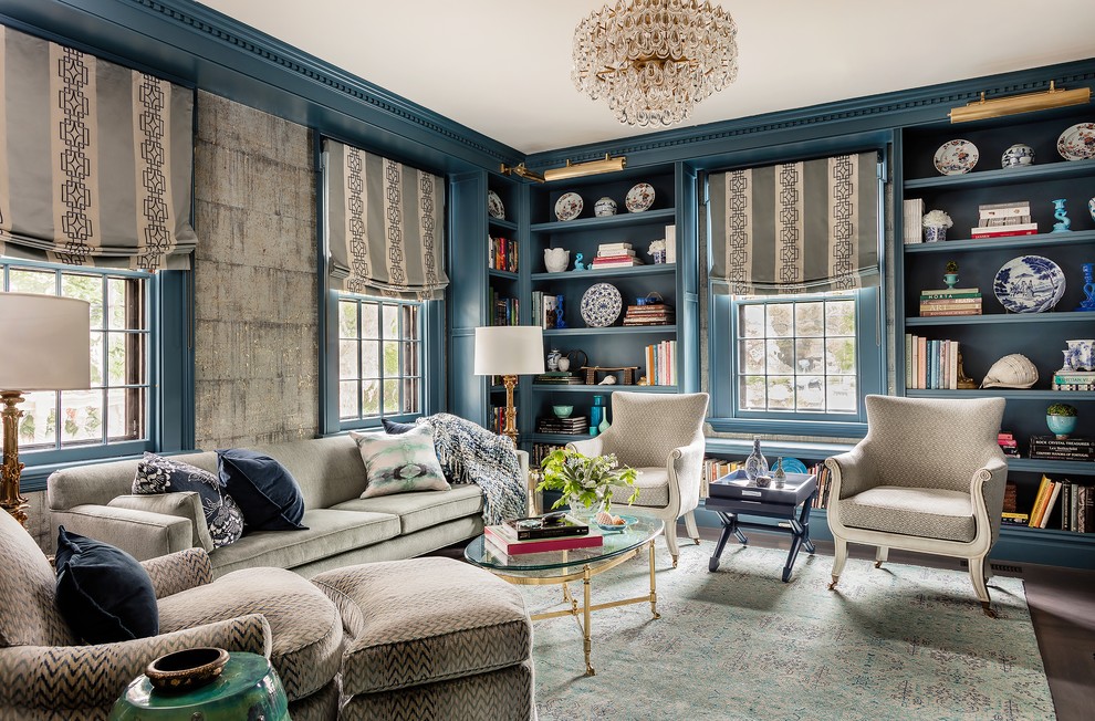 Elegant enclosed dark wood floor and brown floor living room photo in Boston with blue walls