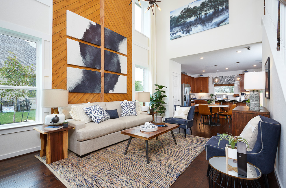 Immagine di un soggiorno minimal di medie dimensioni e aperto con pareti bianche, parquet scuro e pavimento marrone