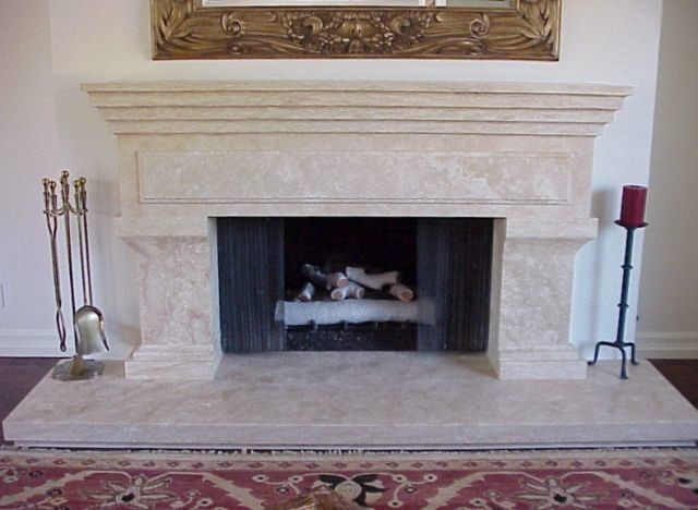 This is an example of a medium sized traditional formal open plan living room in Phoenix with beige walls, travertine flooring, a standard fireplace, a tiled fireplace surround and a wall mounted tv.