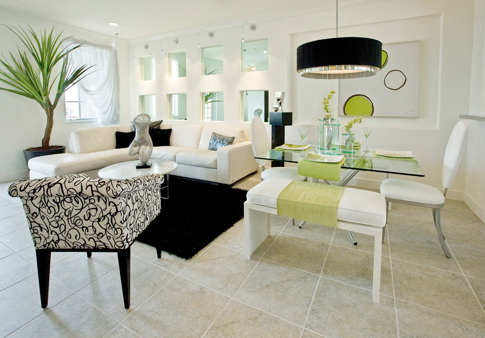 Photo of a contemporary living room in Miami with white walls.