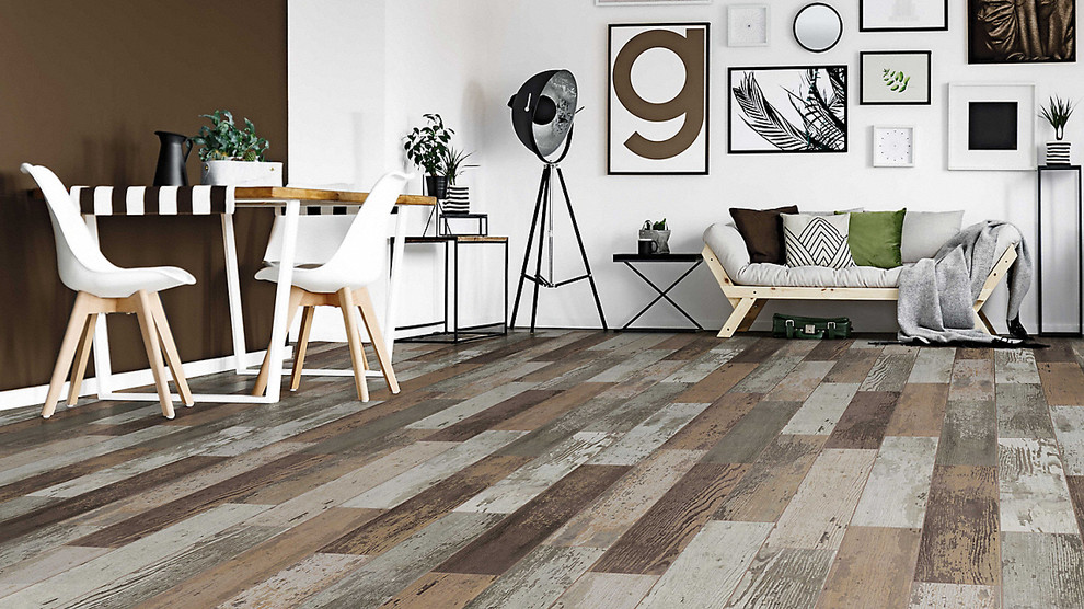 Trendy porcelain tile and multicolored floor living room photo in Other
