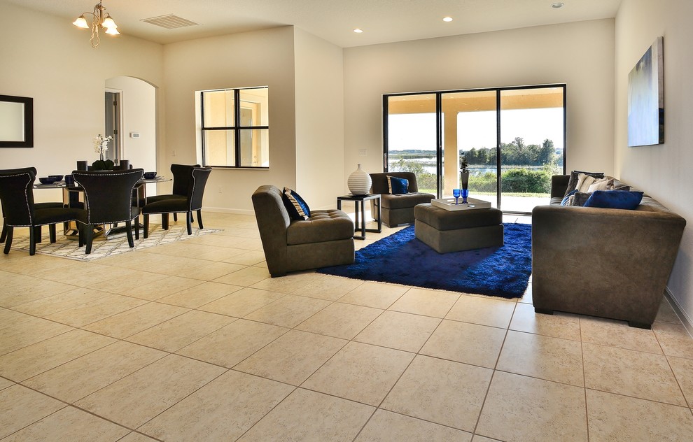 Esempio di un soggiorno moderno di medie dimensioni e aperto con sala formale, pareti beige, pavimento con piastrelle in ceramica e pavimento beige