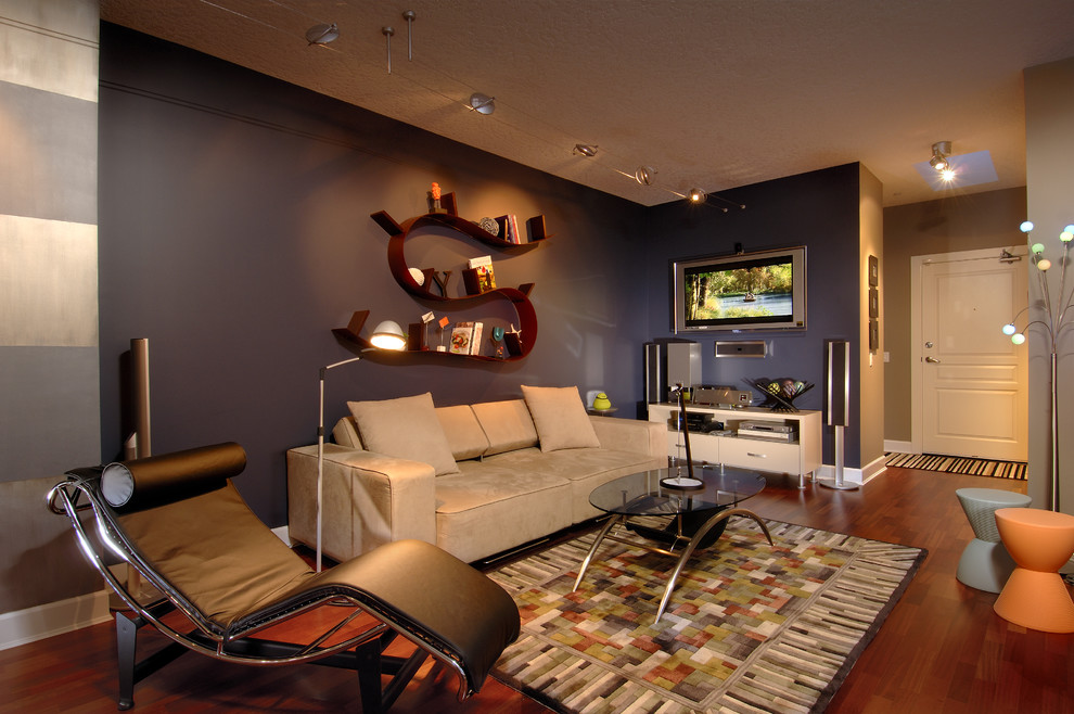 Immagine di un soggiorno design con parete attrezzata