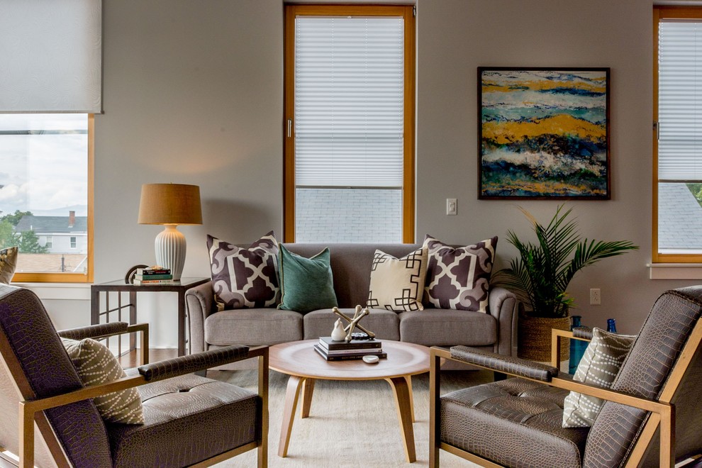 Photo of a medium sized contemporary formal and grey and teal open plan living room in Portland Maine with grey walls, carpet, no fireplace and no tv.