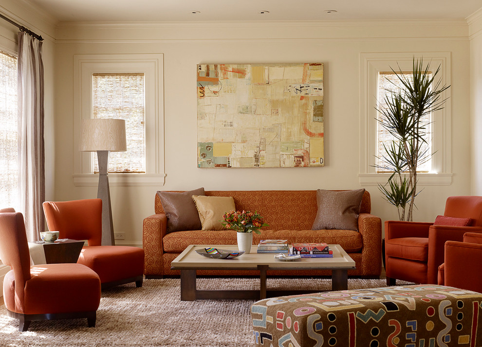Example of a mid-sized trendy enclosed carpeted living room design in San Francisco with white walls, no fireplace and no tv
