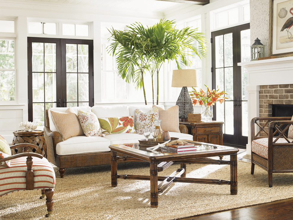 Medium sized world-inspired open plan living room in Orange County with white walls and medium hardwood flooring.