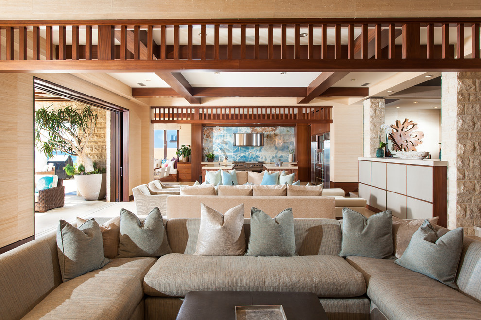 Example of an island style living room design in Orange County