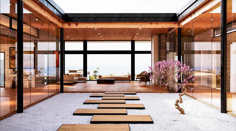 Esempio di un soggiorno minimal con pavimento in legno verniciato