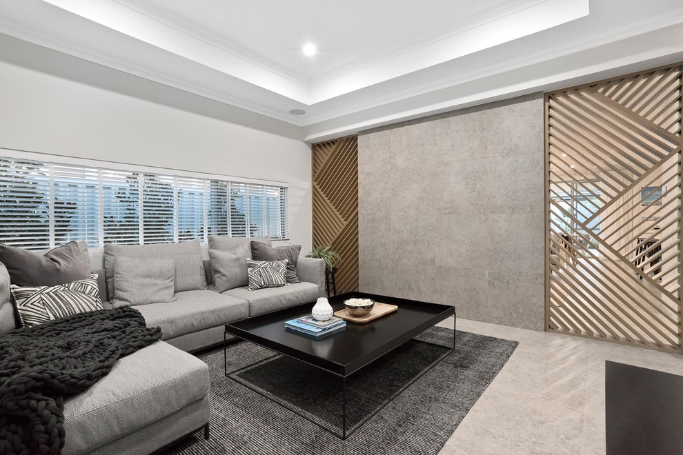 Ispirazione per un soggiorno minimal di medie dimensioni e chiuso con pareti grigie e pavimento beige