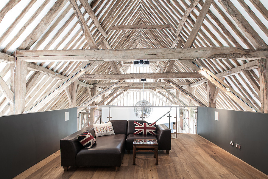 Design ideas for a rural mezzanine living room in Essex with medium hardwood flooring.