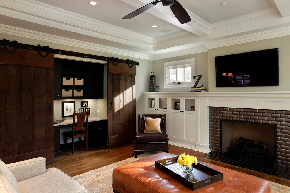 Arts and crafts open concept dark wood floor living room photo in Chicago with a standard fireplace, a brick fireplace and a wall-mounted tv