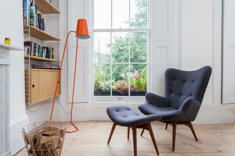 Living room - scandinavian living room idea in London