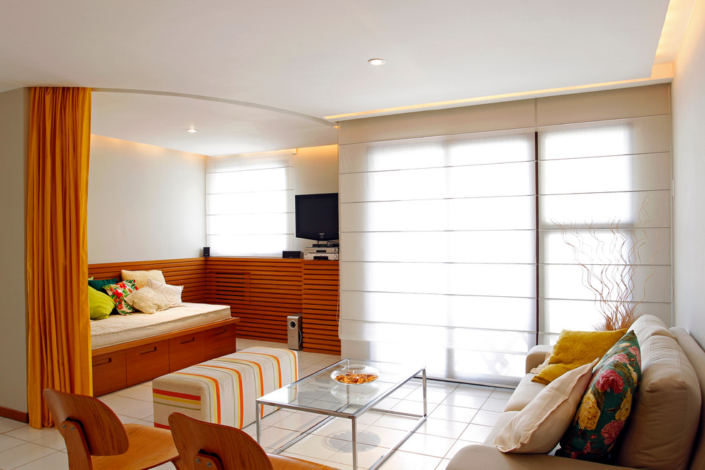 Example of a trendy living room design in Other with a wall-mounted tv