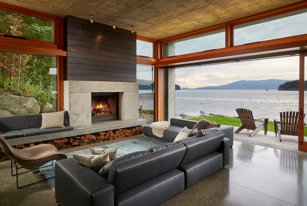 Photo of a contemporary living room in Seattle with a standard fireplace.