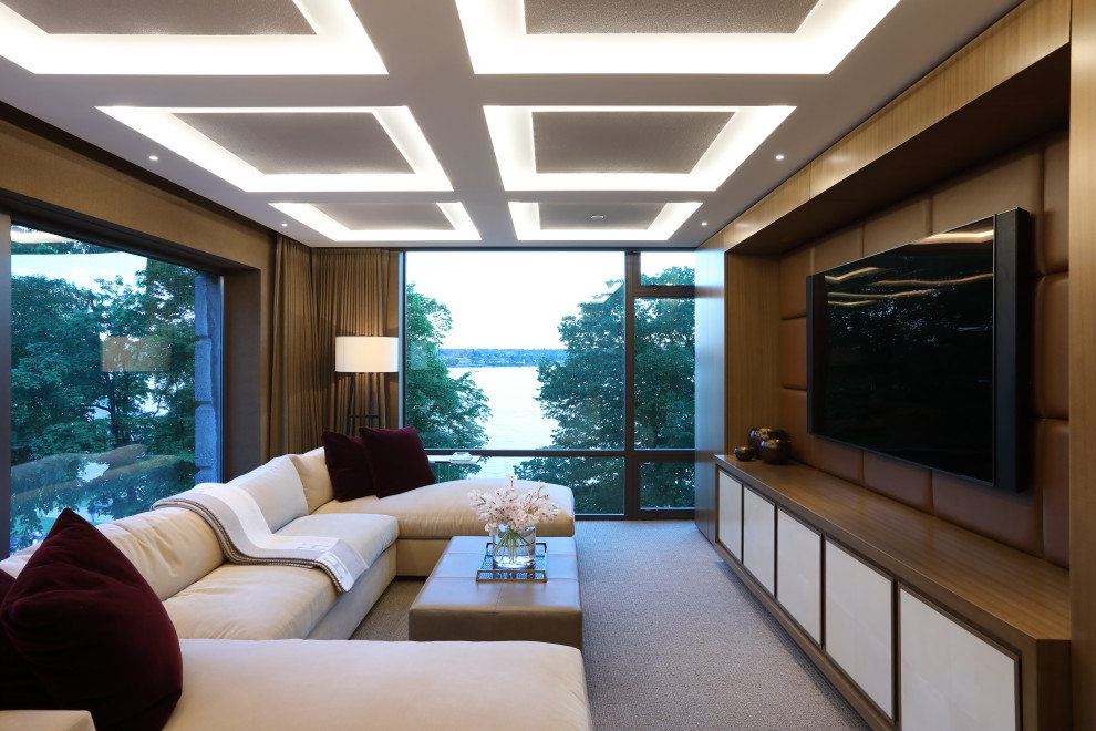 Mittelgroßes Modernes Wohnzimmer mit brauner Wandfarbe, Teppichboden, Multimediawand und grauem Boden in Vancouver