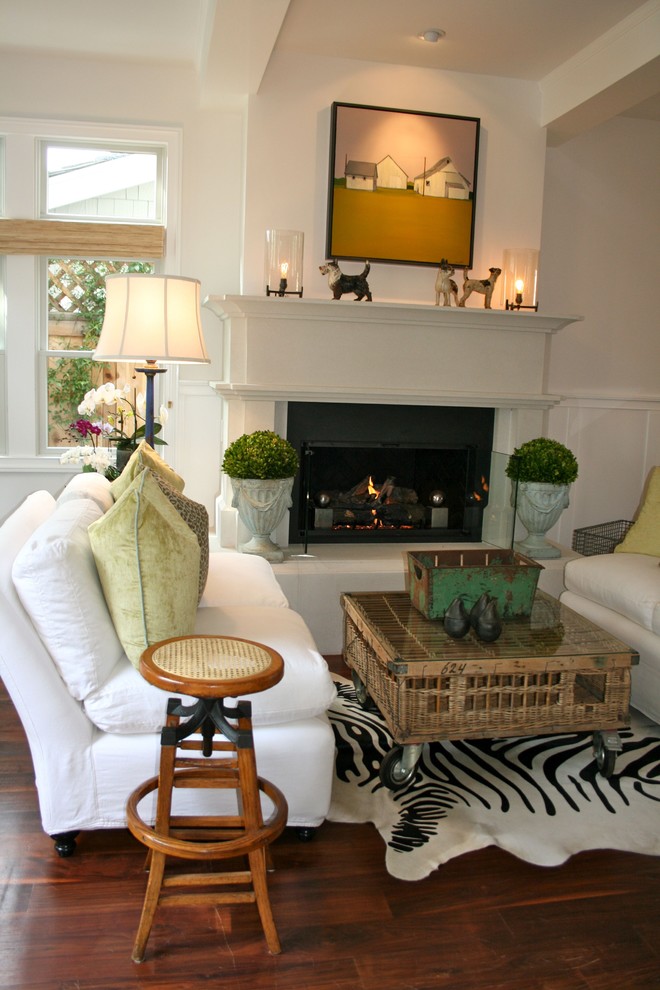 Inspiration for a coastal dark wood floor living room remodel in Los Angeles with white walls