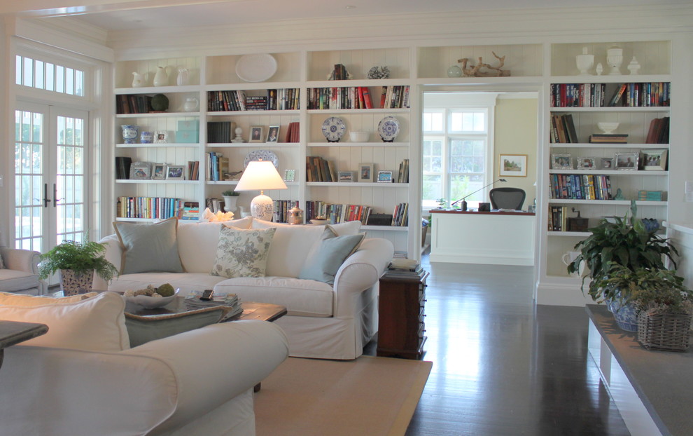 Example of a beach style living room design in Boston