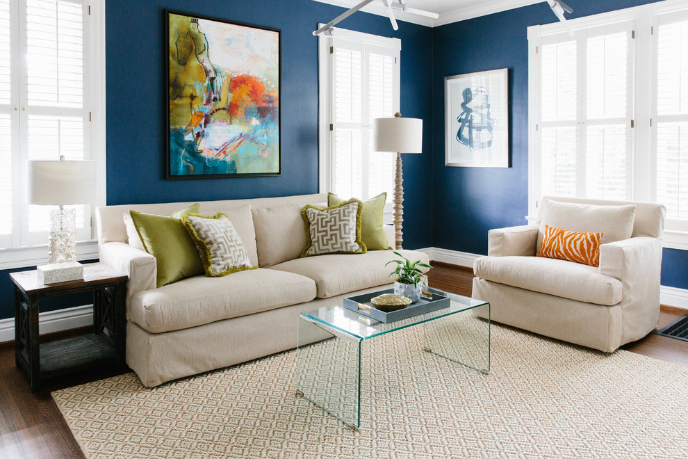 Photo of a nautical formal living room in Louisville with blue walls, dark hardwood flooring and no fireplace.