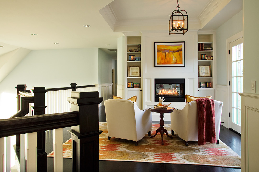 Example of a beach style loft-style living room library design in Portland