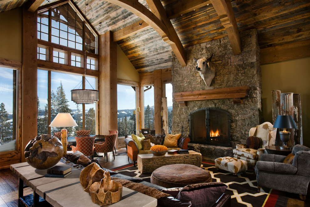 Design ideas for a traditional living room in Other with a stone fireplace surround.