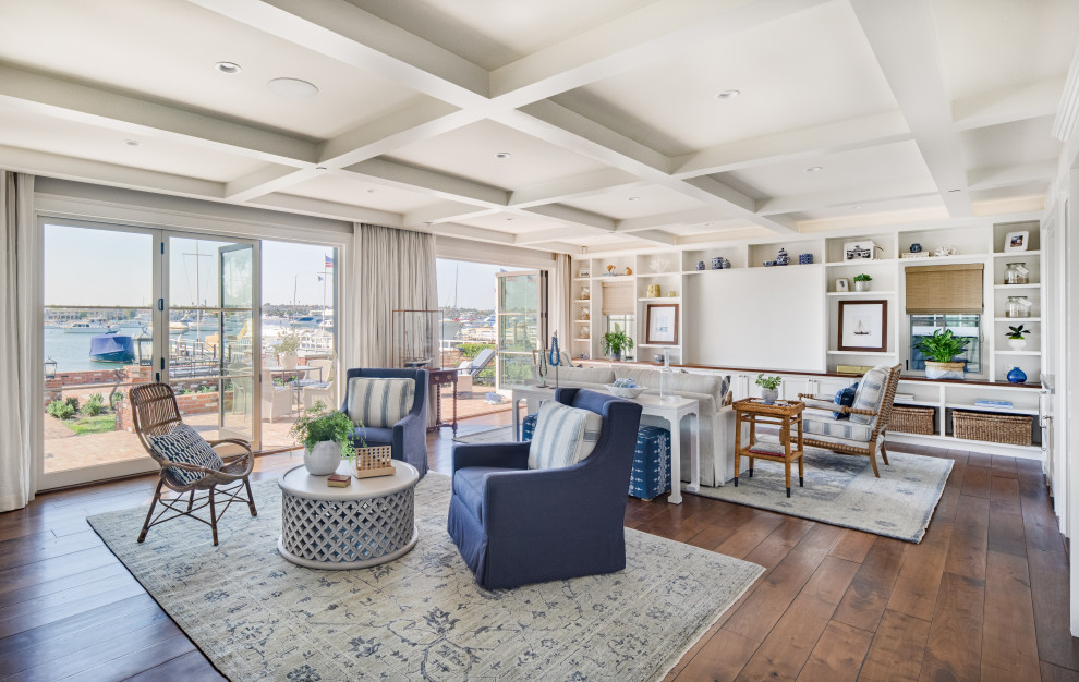Beach style living room in Orange County with a coffered ceiling.