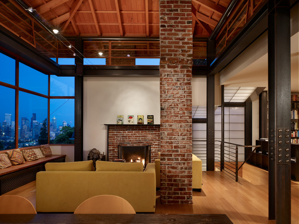 This is an example of a medium sized industrial living room in Seattle.