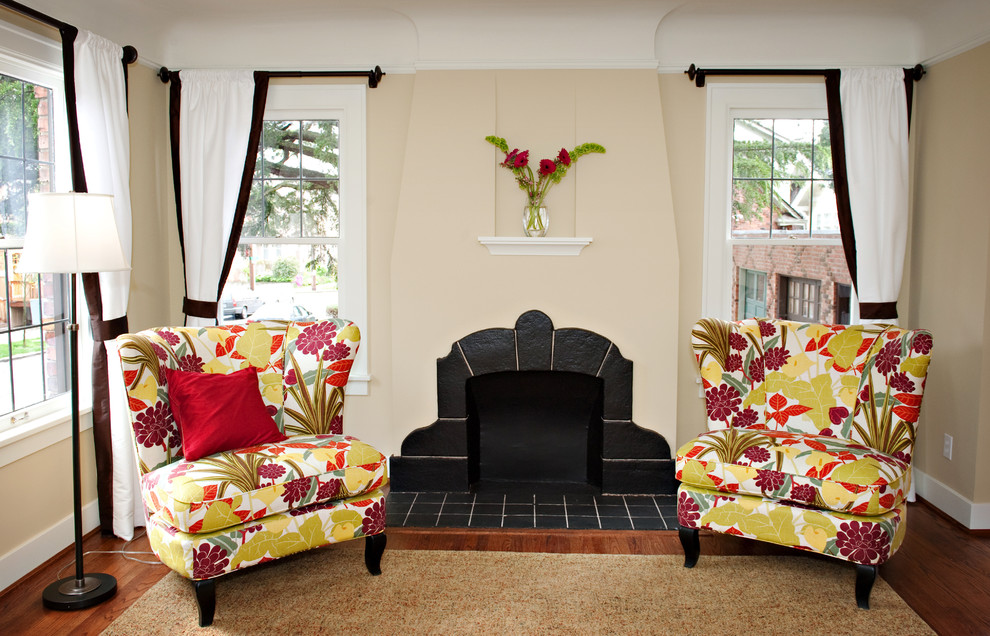 Eclectic living room in Seattle with beige walls.