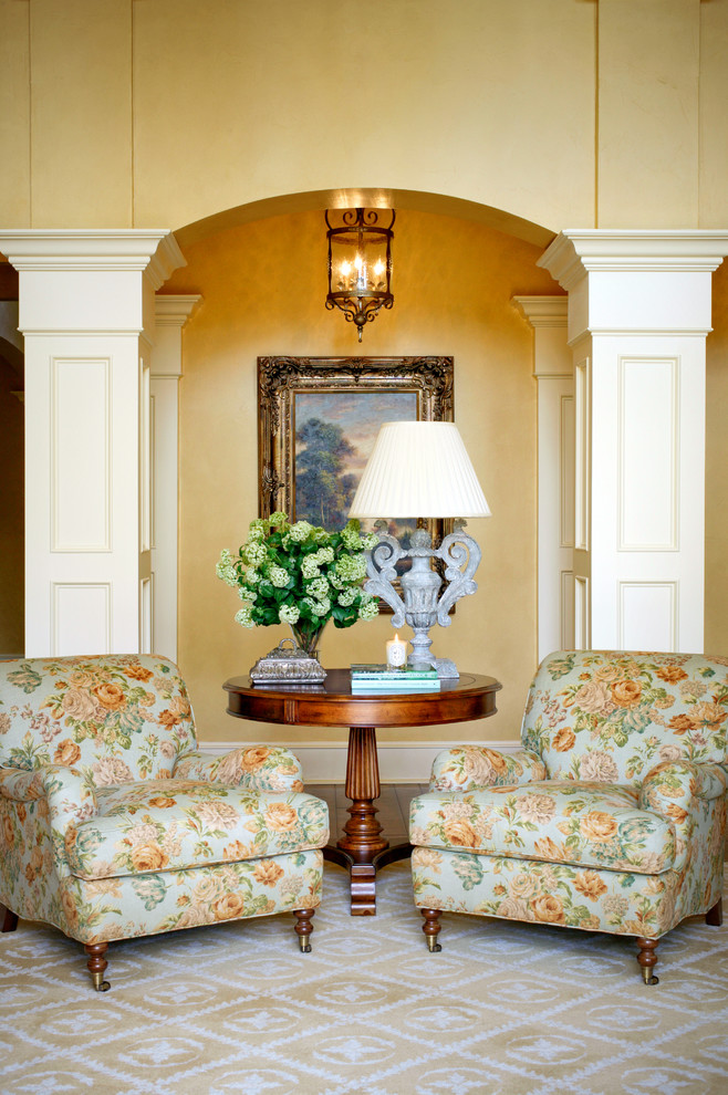 Inspiration for a timeless living room remodel in Little Rock with yellow walls