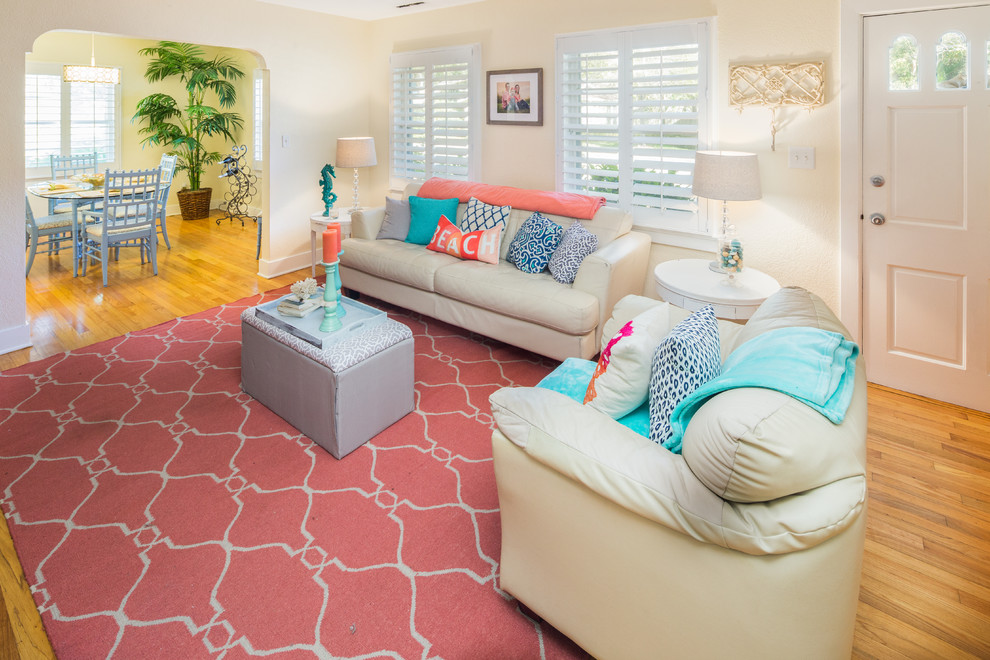 Design ideas for a coastal living room in Tampa.