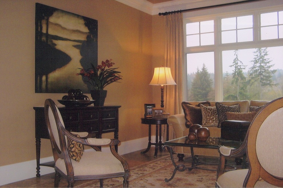 На фото: парадная, открытая гостиная комната среднего размера в классическом стиле с бежевыми стенами и паркетным полом среднего тона без камина, телевизора с