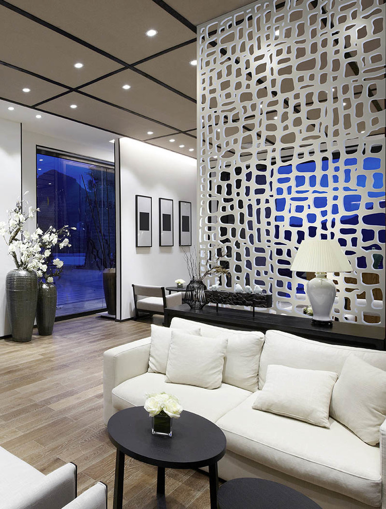 Inspiration for a mid-sized modern formal and open concept vinyl floor living room remodel in Phoenix with white walls