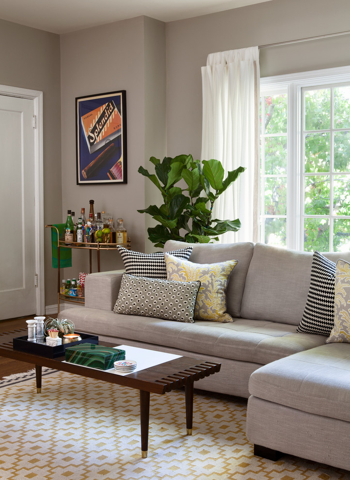 Medium sized classic enclosed living room in San Francisco with grey walls and medium hardwood flooring.