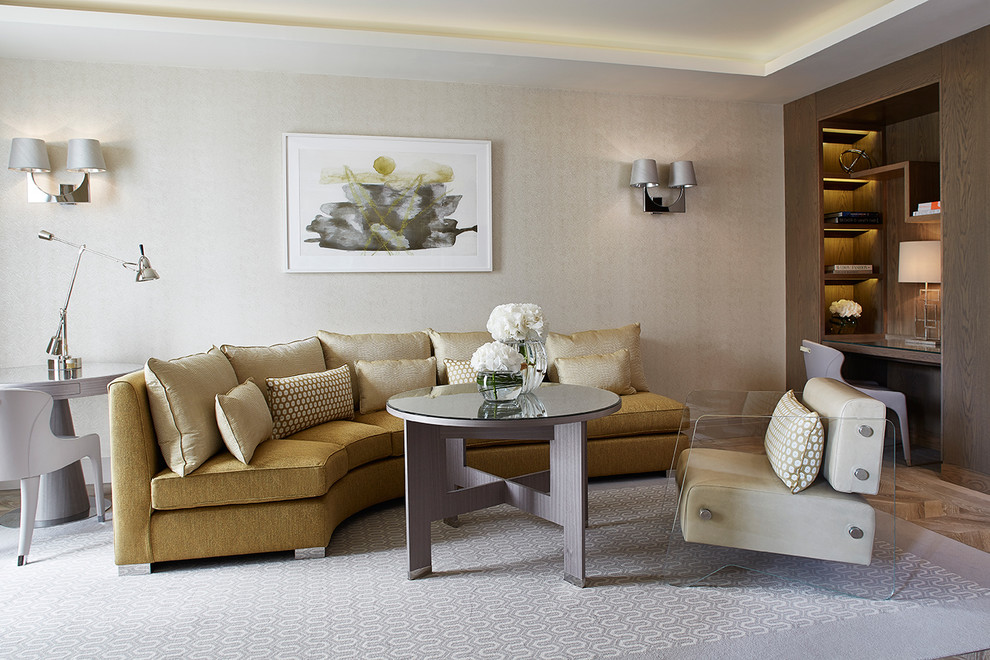Inspiration for a contemporary living room in London with light hardwood flooring and beige walls.