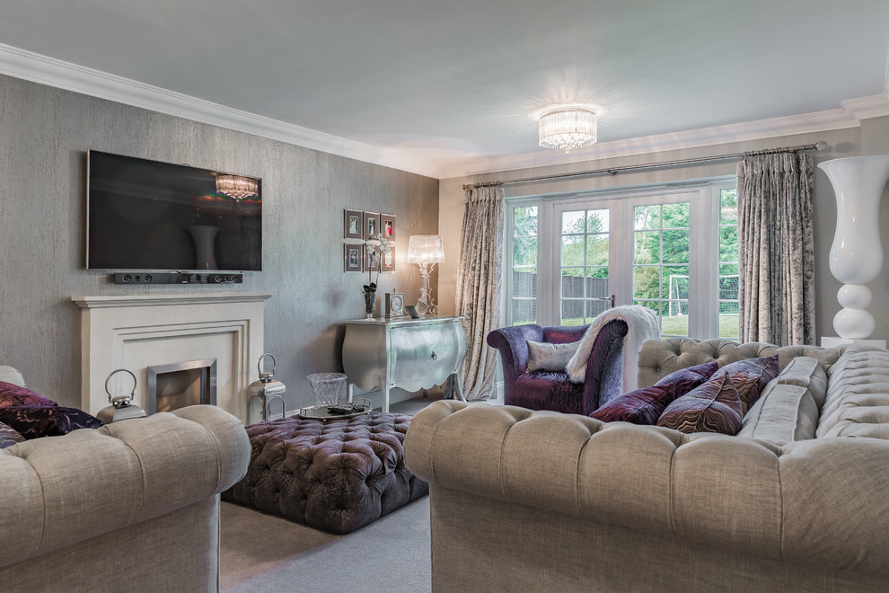 Medium sized classic enclosed living room in Hertfordshire with grey walls, carpet, a standard fireplace, a wall mounted tv and grey floors.