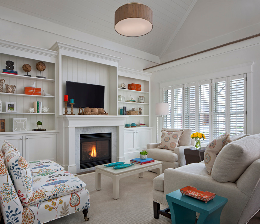 Living room - mid-sized coastal open concept medium tone wood floor living room idea in Other with white walls, a standard fireplace, a stone fireplace and a media wall