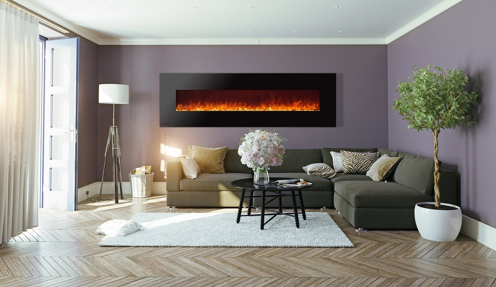 Medium sized contemporary living room in Indianapolis with purple walls, light hardwood flooring, a hanging fireplace and beige floors.