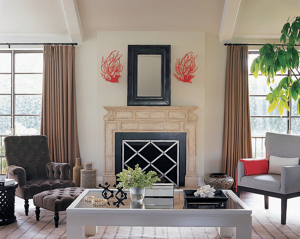 Trendy living room photo in Los Angeles with a standard fireplace
