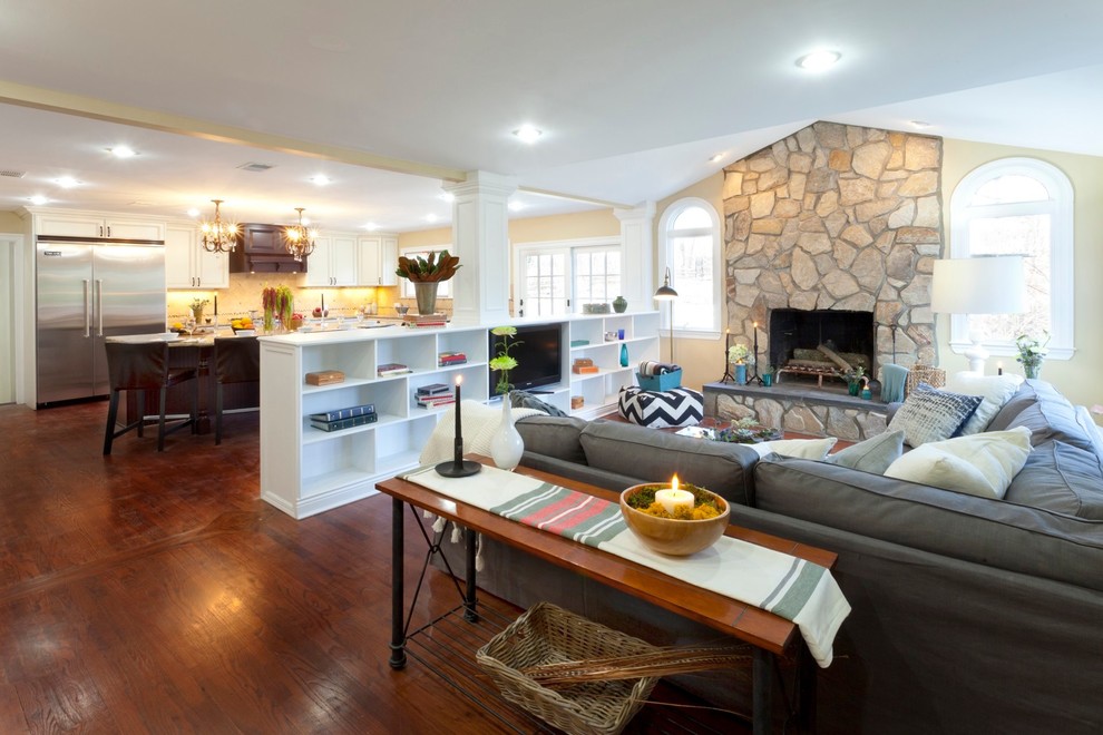 Living room - traditional living room idea in New York with beige walls and a standard fireplace