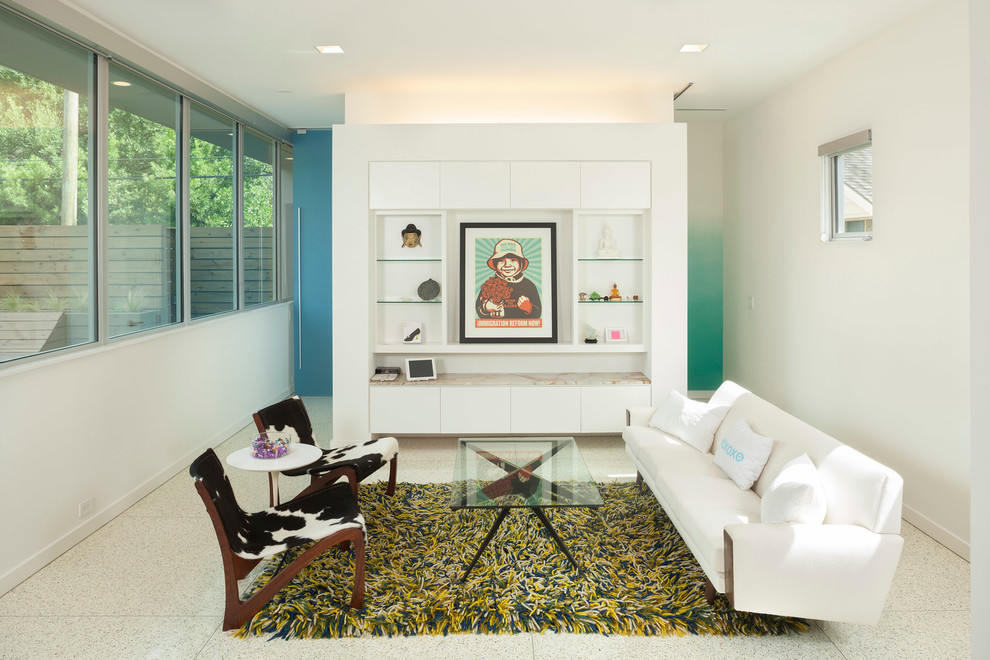 Inspiration for a small modern living room in Houston with white walls.