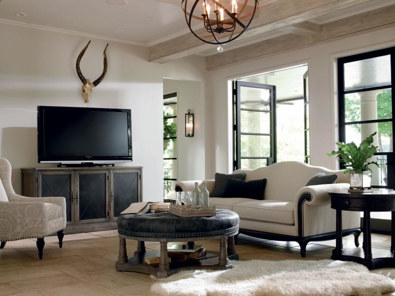 Idéer för att renovera ett mellanstort rustikt vardagsrum, med vita väggar och en fristående TV