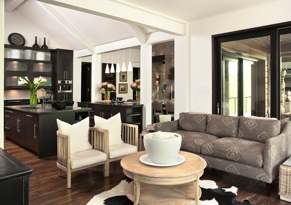 Inspiration for a rustic dark wood floor living room remodel in Other with white walls