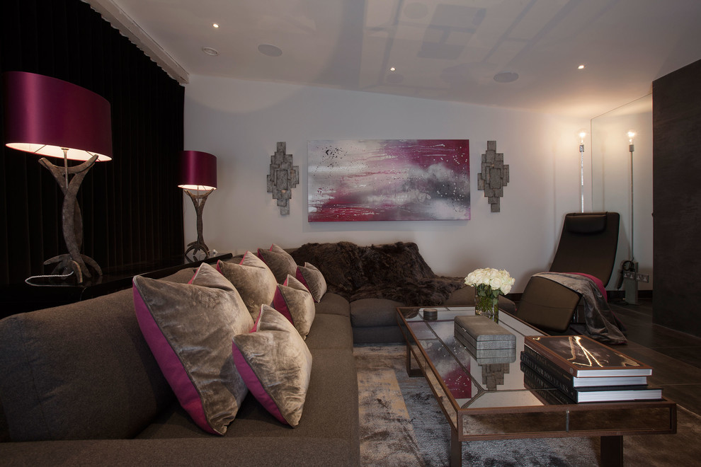 Inspiration for a large contemporary open plan living room in Surrey with white walls, a wall mounted tv, porcelain flooring, a ribbon fireplace, a metal fireplace surround and black floors.