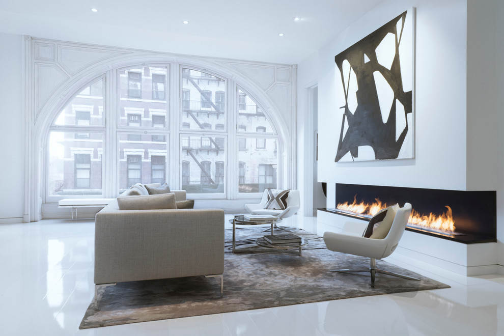Inspiration for a scandinavian living room remodel in New York with white walls and a ribbon fireplace